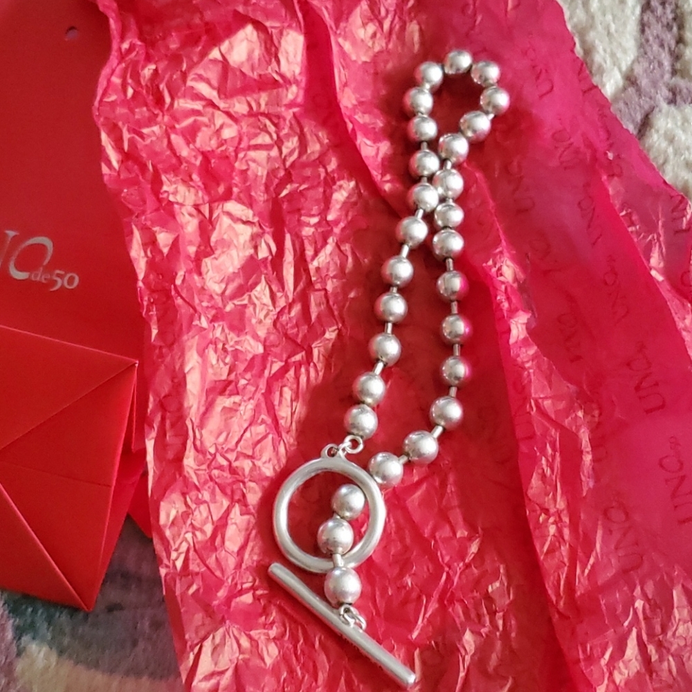 Uno  duo HP Jan  2026 beaded chocker with extra uno and silver cleaner uno deal